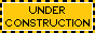 yellow-and-black button that says 'under construction'